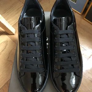 A.testoni black patent sneakers